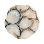 Tavolo ondulato in pietra organica e metallo