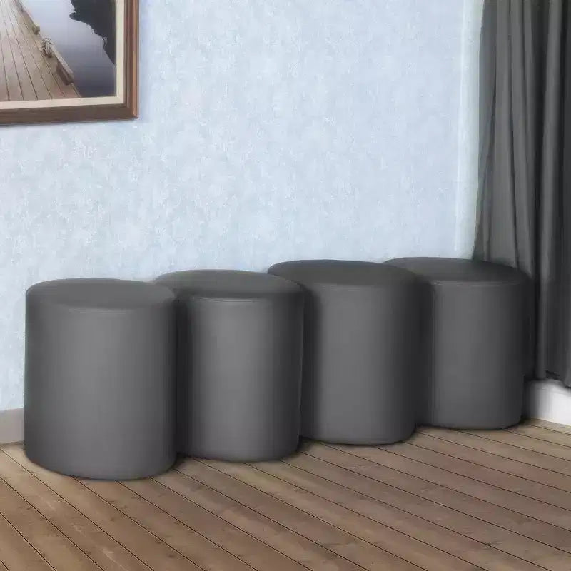 Pouf rotondo in vinile Logan (set di 4)